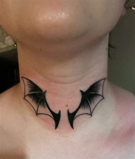 bat tattoo on neck|More.